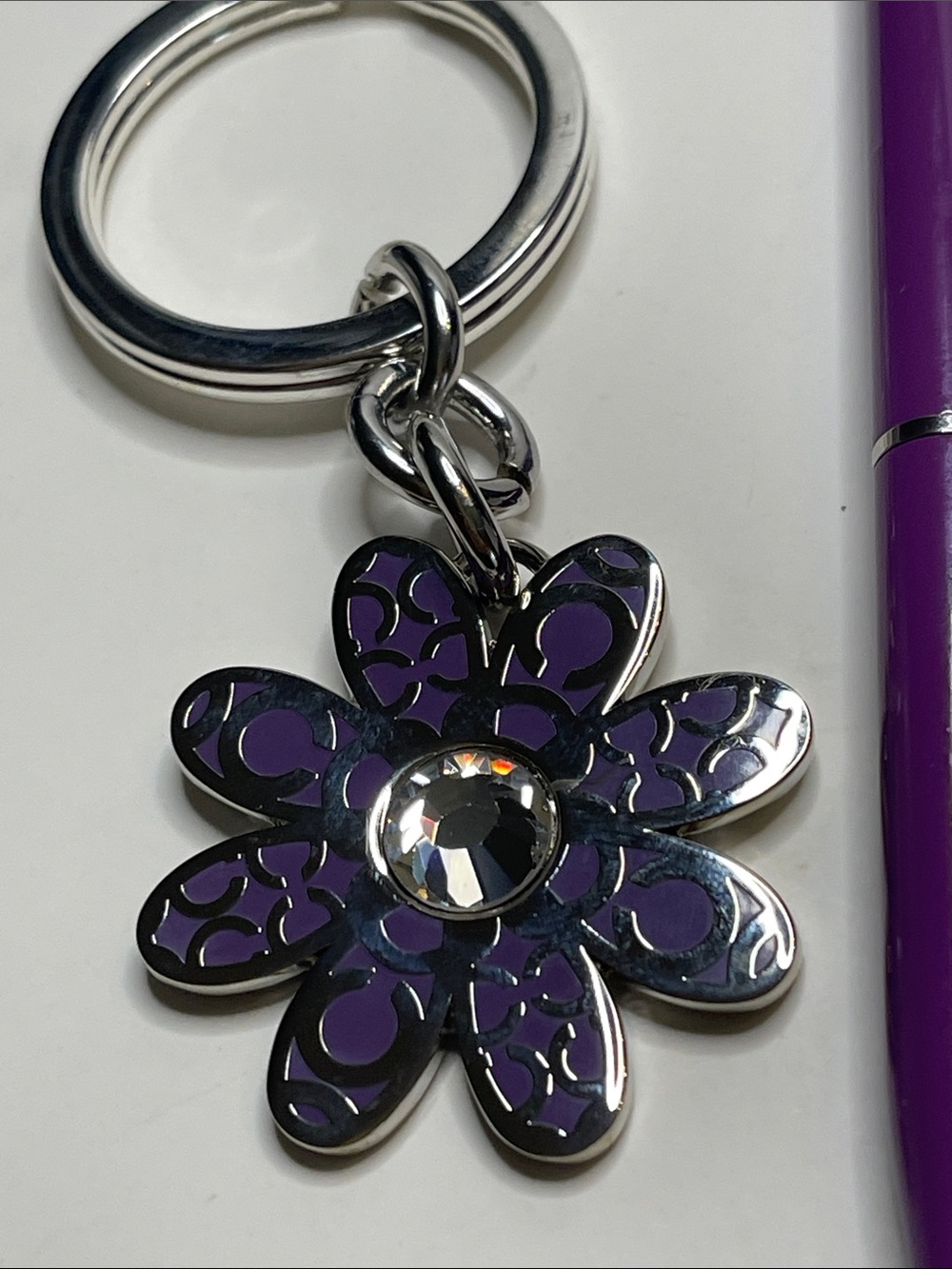 Coach Flower Charm Keyring with Purple Enamel, Crystal, and Coach Pen - Picture 2 of 6